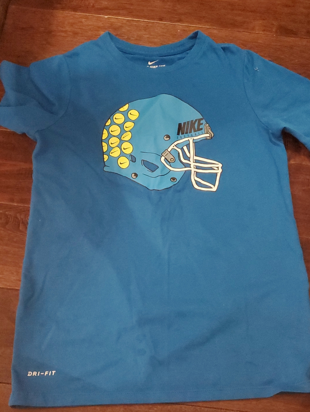 Nike Blue Short Sleeve Tee with Yellow-Accent Helmet Graphic Size Medium Youth